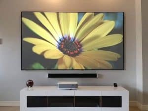 Elite Screens Aeon CLR® Series projector screen with ambient light rejecting technology.