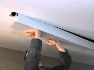 Evanesce Tab-Tension Series projector screen for home theaters and presentations.