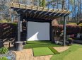 Outdoor projector screen for backyard entertainment and movie nights.