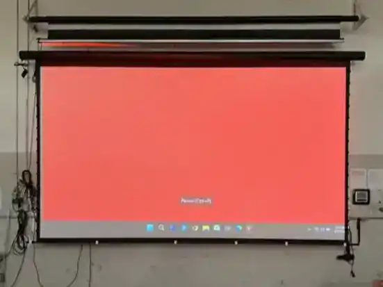 Large red projection screen with black frame and ceiling mounts.