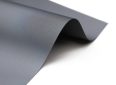 Close-up of sleek, durable projector screen fabric for home or business use.