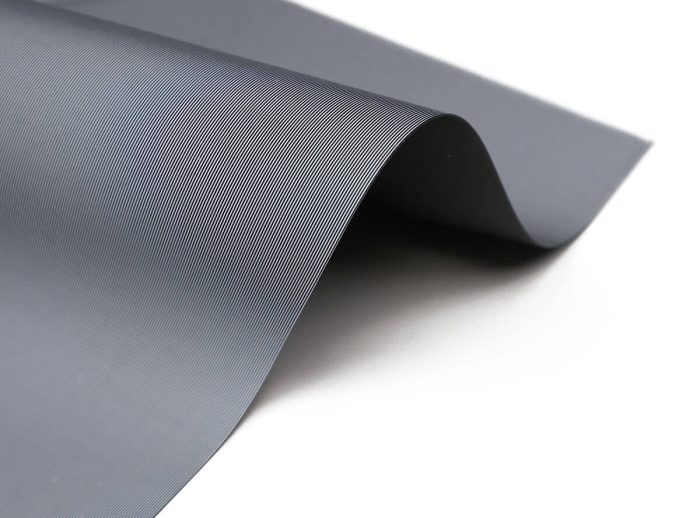 Quality Projector Screen Material Close-up of sleek, durable projector screen fabric for home or business use.