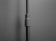 Close-up of a black projector screen mounting pole for ceiling installation.